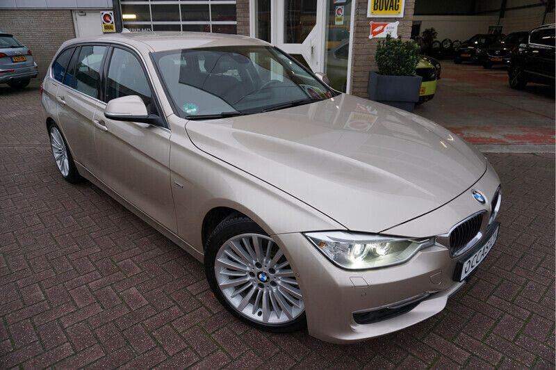 Grijs Gebruikt 2013 BMW 328 Luxury Line Stationwagen | € 18.285 (Eerlijke prijs) - Afbeelding 1/4