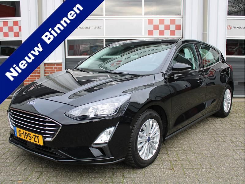 Zwart (metallic) Gebruikt 2020 Ford Focus Business Edition Hatchback | € 15.995 (Eerlijke prijs) - Afbeelding 1/4