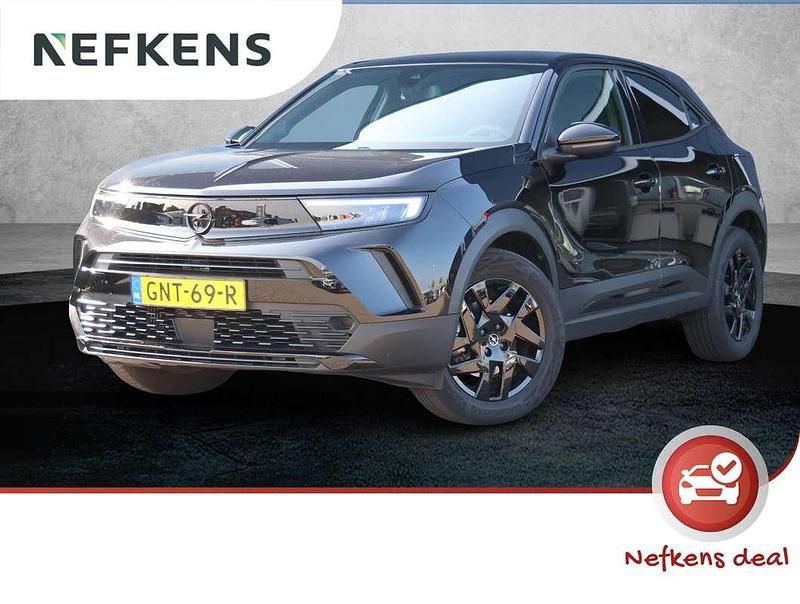 Zwart, metallic lak Gebruikt 2024 Opel Mokka Sport SUV | € 27.925 - Afbeelding 1/3