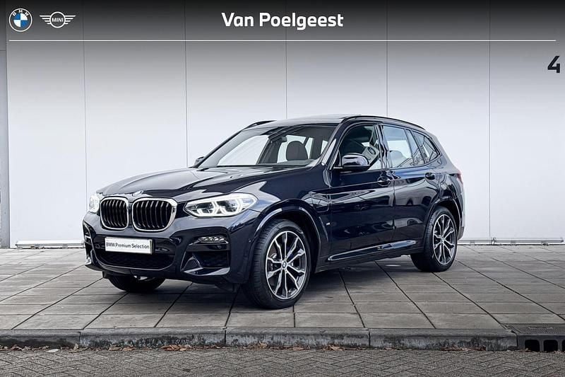 M carbonschwarz (donker zwart) Gebruikt 2021 BMW X3 Executive SUV | € 44.900 (Eerlijke prijs) - Afbeelding 1/4