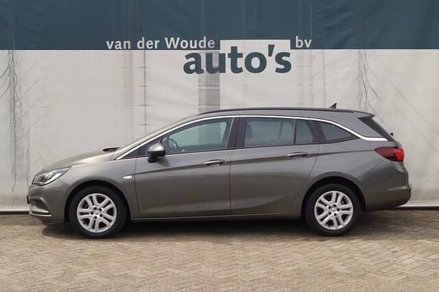 Occasion Opel Astra Business 110 PK (80 kW) 2019 Grijs, metallic lak Stationwagen