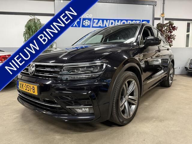 Zwart Gebruikt 2018 VW Tiguan Highline SUV | € 17.995 (Eerlijke prijs) - Afbeelding 1/4