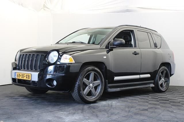 Zwart, metallic lak Gebruikt 2007 Jeep Compass Limited SUV | € 6.999 (Iets duurder) - Afbeelding 1/4