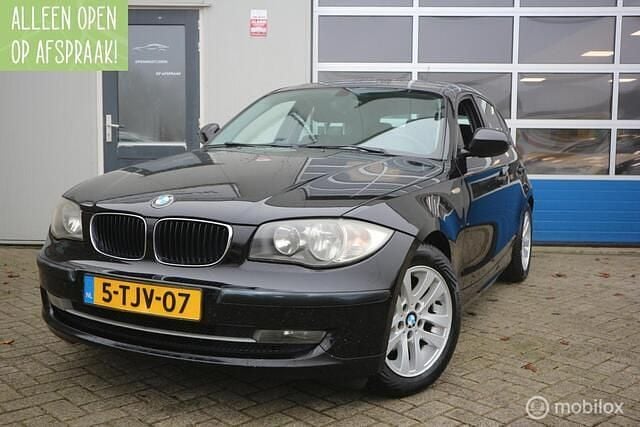 Zwart Gebruikt 2010 BMW 116 Hatchback | € 2.900 (Super prijs) - Afbeelding 1/4