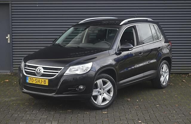 Zwart Gebruikt 2011 VW Tiguan Sport SUV | € 6.950 (Goede deal) - Afbeelding 1/4