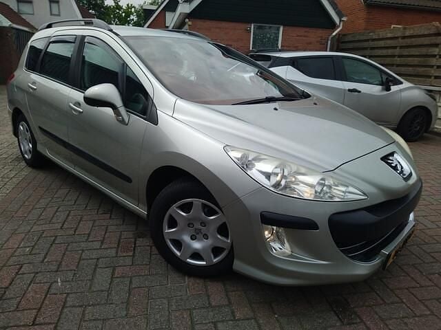 Grijs Gebruikt 2009 Peugeot 308 Stationwagen | € 1.999 (Eerlijke prijs) - Afbeelding 1/4
