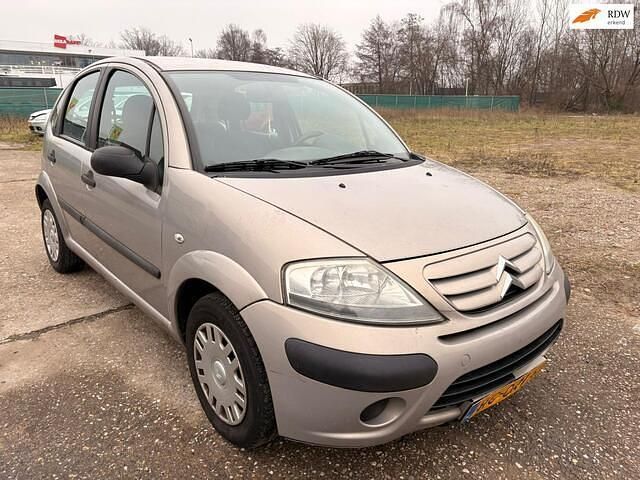 Bruin Occasion 2005 Citroën C3 Prestige Hatchback | € 1.499 (Eerlijke prijs) - Afbeelding 1/4