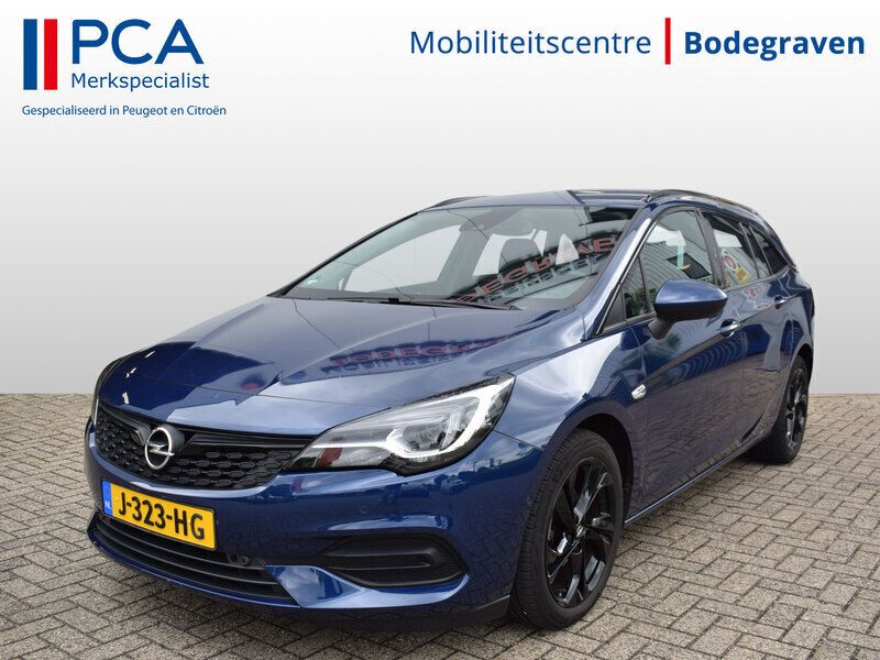 Blauw Gebruikt 2020 Opel Astra Elegance Stationwagen | € 17.995 (Iets duurder) - Afbeelding 1/4