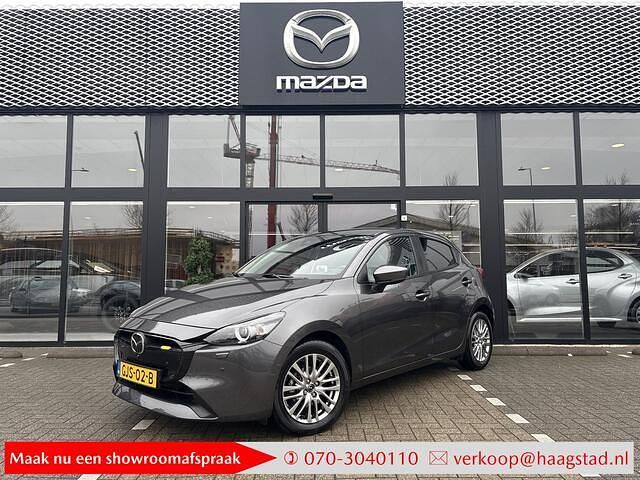 Machine grey Occasion 2024 Mazda 2 Exclusive-Line Hatchback | € 21.750 (Eerlijke prijs) - Afbeelding 1/4