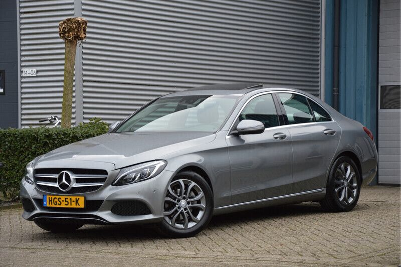 Grijs Gebruikt 2016 Mercedes C180 Ambition Sedan | € 19.750 (Eerlijke prijs) - Afbeelding 1/4