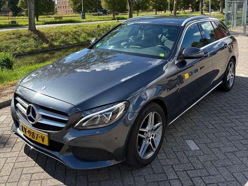Grijs Gebruikt 2016 Mercedes C300 AMG Stationwagen | € 13.000 (Eerlijke prijs) - Afbeelding 1/4
