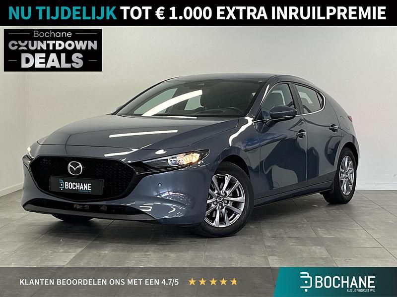 Grijs Gebruikt 2022 Mazda 3 Comfort Hatchback | € 22.595 (Goede deal) - Afbeelding 1/4