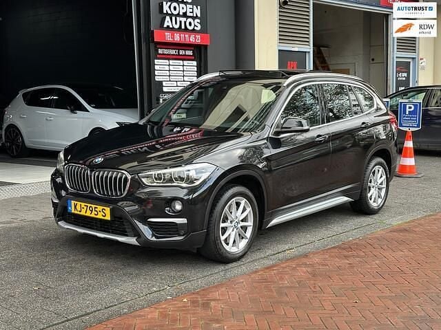 Zwart Gebruikt 2016 BMW X1 Comfort Edition SUV | € 15.950 (Goede deal) - Afbeelding 1/4