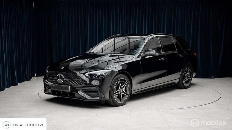 Zwart Gebruikt 2023 Mercedes C300e AMG line Stationwagen | € 41.950 (Goede deal) - Afbeelding 1/4