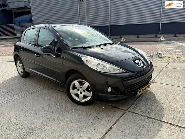 Zwart, metallic lak Gebruikt 2011 Peugeot 207 Hatchback | € 3.299 (Goede deal) - Afbeelding 1/4