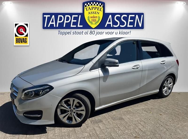 Grijs Gebruikt 2018 Mercedes B180 Ambition MPV | € 16.950 (Eerlijke prijs) - Afbeelding 1/4