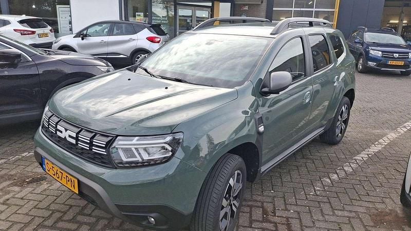 Grijs Occasion 2023 Dacia Duster Journey SUV | € 20.945 (Eerlijke prijs) - Afbeelding 1/3