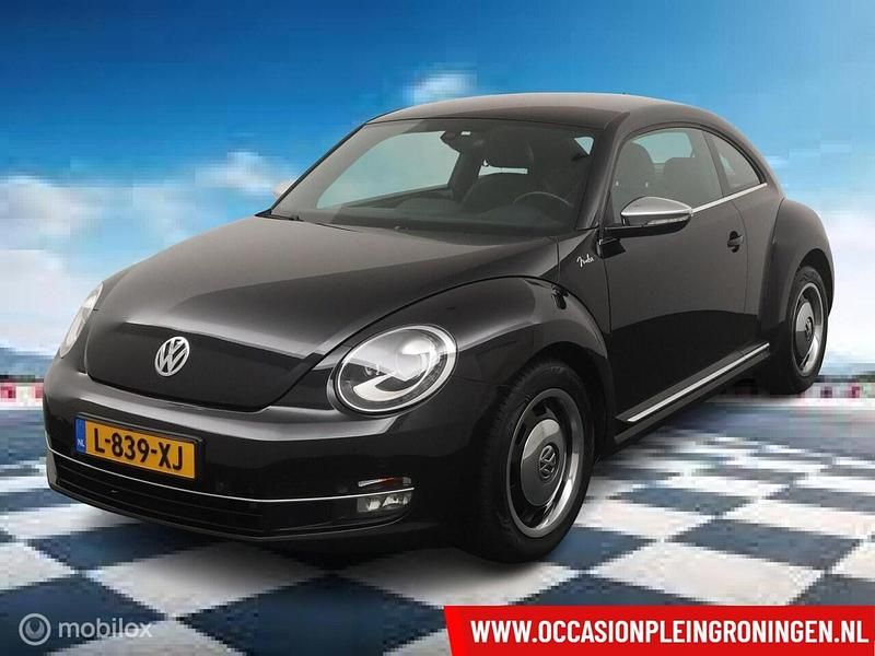 Zwart Gebruikt 2012 VW Beetle Hatchback | € 9.950 (Eerlijke prijs) - Afbeelding 1/4
