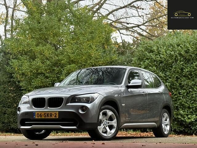 Grijs (metallic) Gebruikt 2011 BMW X1 xLine SUV | € 8.450 (Eerlijke prijs) - Afbeelding 1/4