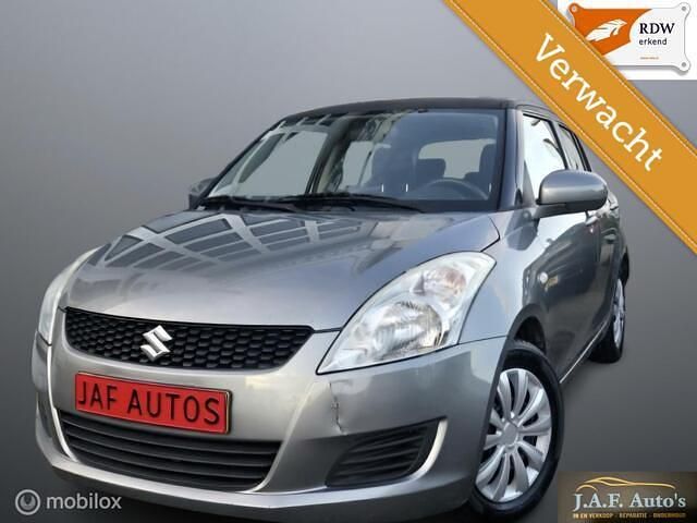 Grijs Gebruikt 2013 Suzuki Swift Hatchback | € 3.999 (Goede deal) - Afbeelding 1/4