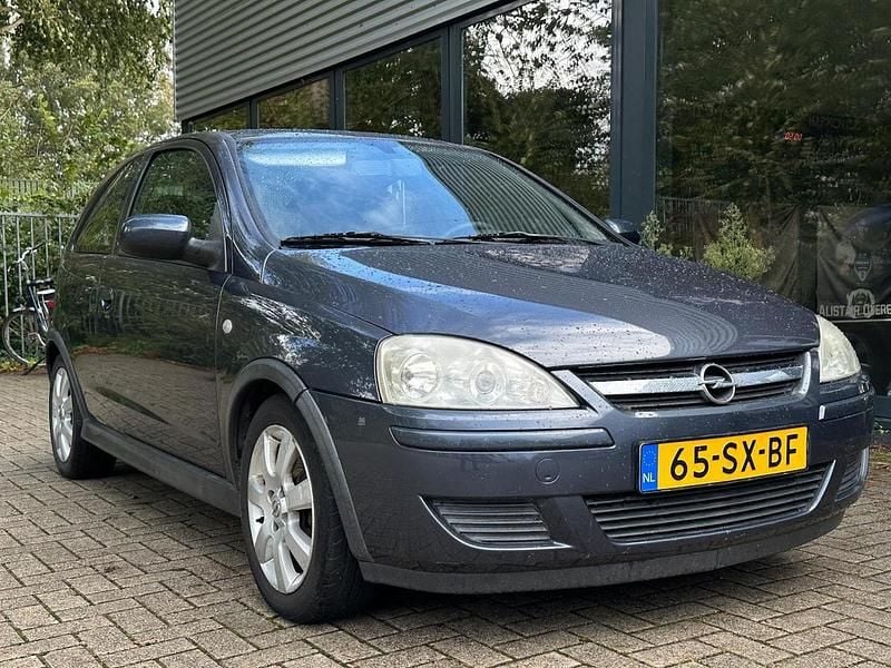 Grijs Gebruikt 2006 Opel Corsa Hatchback | € 1.700 (Super prijs) - Afbeelding 1/4