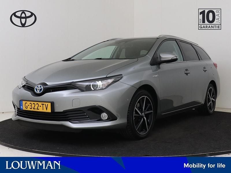 Grijs Gebruikt 2019 Toyota Auris Hybrid Stationwagen | € 19.950 (Eerlijke prijs) - Afbeelding 1/4