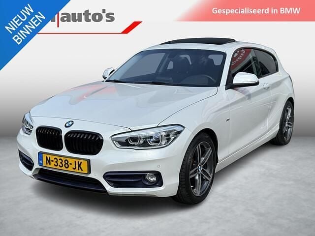 Wit Gebruikt 2015 BMW 118 Executive Hatchback | € 13.999 (Super prijs) - Afbeelding 1/4