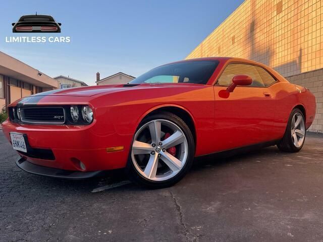 Oranje Gebruikt 2009 Dodge Challenger Coupé | € 27.950 - Afbeelding 1/4