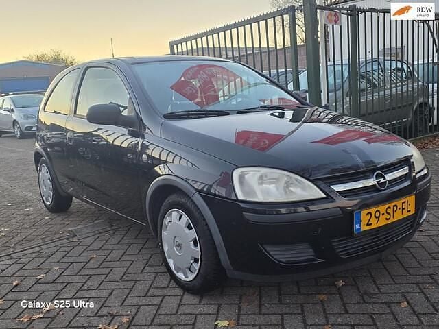 Zwart Gebruikt 2006 Opel Corsa Essentia Hatchback | € 999 (Eerlijke prijs) - Afbeelding 1/4