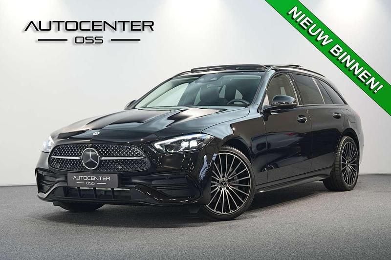 Zwart Gebruikt 2024 Mercedes C300e AMG Stationwagen | € 50.945 (Eerlijke prijs) - Afbeelding 1/4