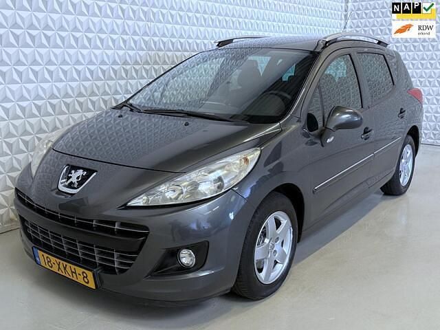Grijs (metallic) Occasion 2012 Peugeot 207 Allure Stationwagen | € 1.999 (Goede deal) - Afbeelding 1/4