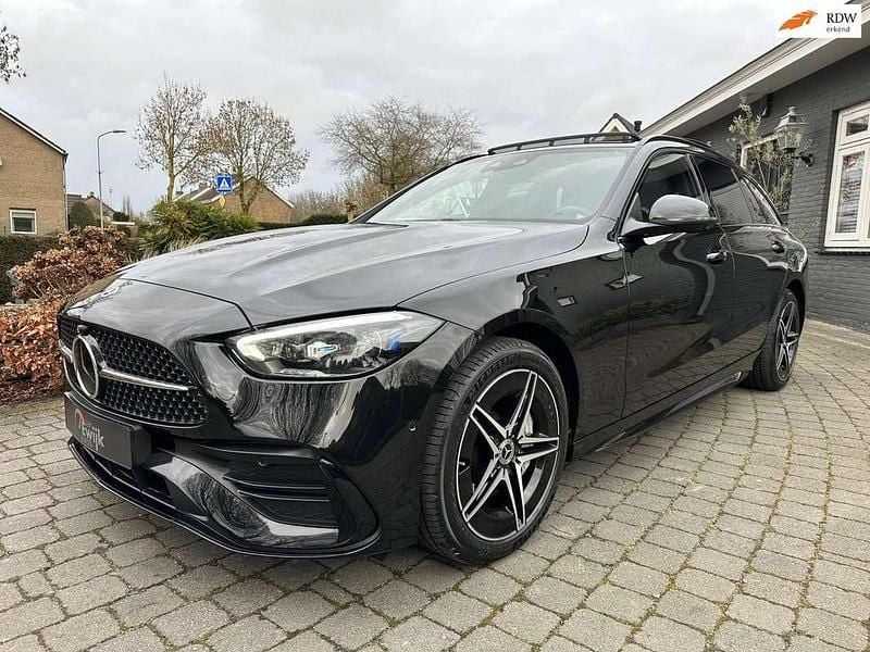 Occasion Mercedes C300e AMG line 204 PK (150 kW) 2023 Zwart Stationwagen