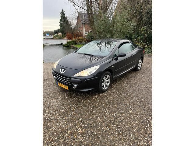 Zwart (metallic) Gebruikt 2006 Peugeot 307 CC Cabriolet | € 1.650 (Eerlijke prijs) - Afbeelding 1/4
