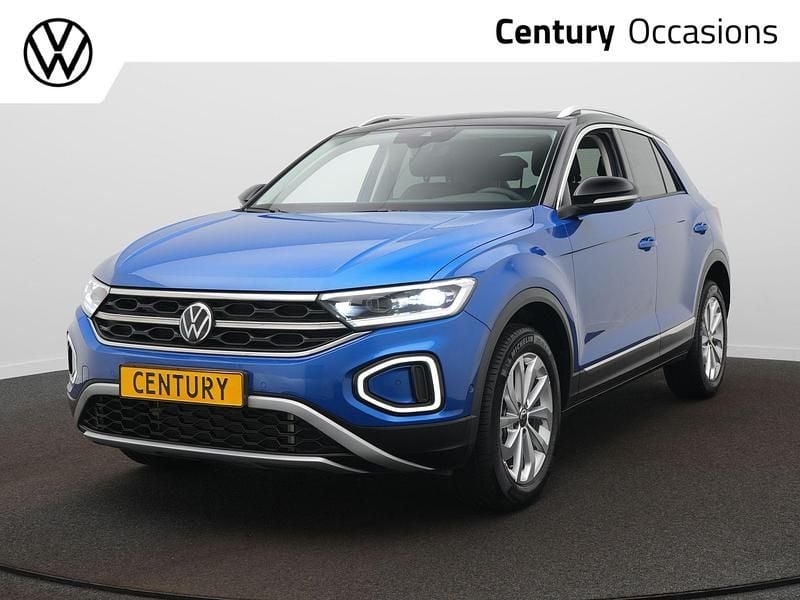 Blauw Gebruikt 2023 VW T-Roc Style SUV | € 27.900 (Eerlijke prijs) - Afbeelding 1/4