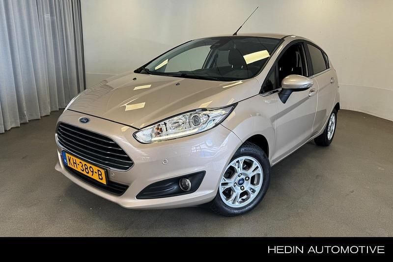 Bruin Gebruikt 2016 Ford Fiesta Titanium Hatchback | € 9.945 (Eerlijke prijs) - Afbeelding 1/3