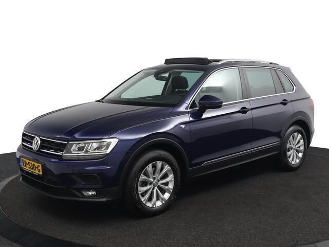 Blauw, metallic lak Gebruikt 2018 VW Tiguan Comfortline SUV | € 17.950 (Goede deal) - Afbeelding 1/4
