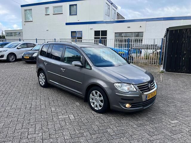 Grijs Gebruikt 2007 VW Touran Highline MPV | € 4.450 (Iets duurder) - Afbeelding 1/4