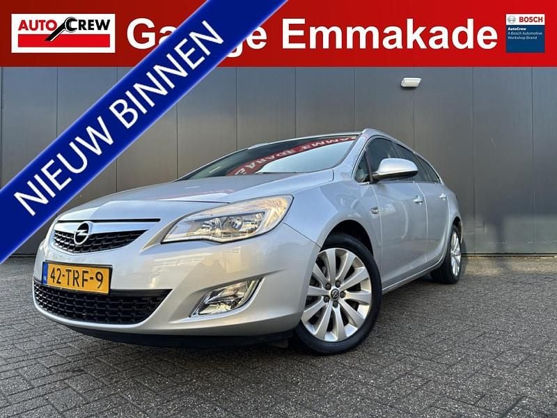 Grijs Occasion 2012 Opel Astra Cosmo Stationwagen | € 6.450 (Eerlijke prijs) - Afbeelding 1/4