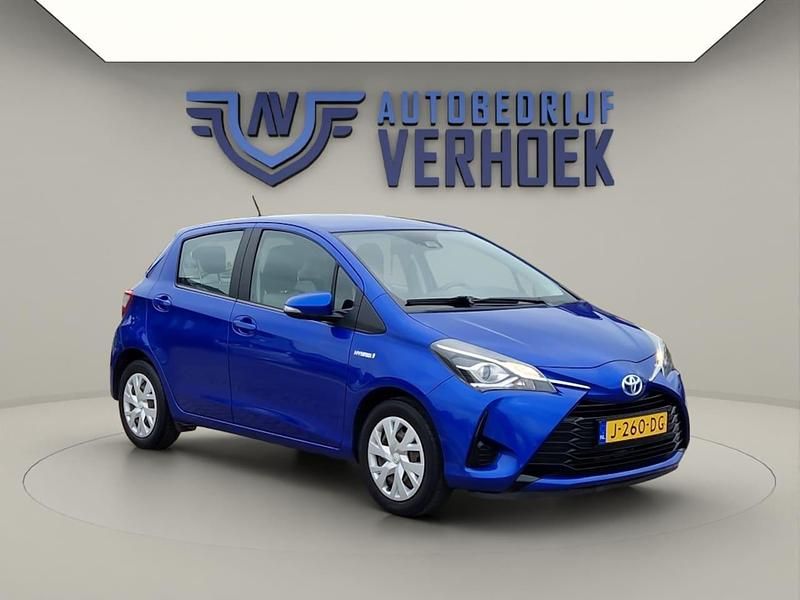 Blauw (metallic) Gebruikt 2020 Toyota Yaris Hybrid Active Hatchback | € 16.900 (Super prijs) - Afbeelding 1/4