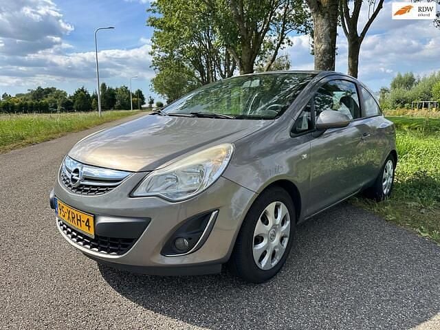 Bruin Gebruikt 2012 Opel Corsa Edition Hatchback | € 1.499 (Eerlijke prijs) - Afbeelding 1/4