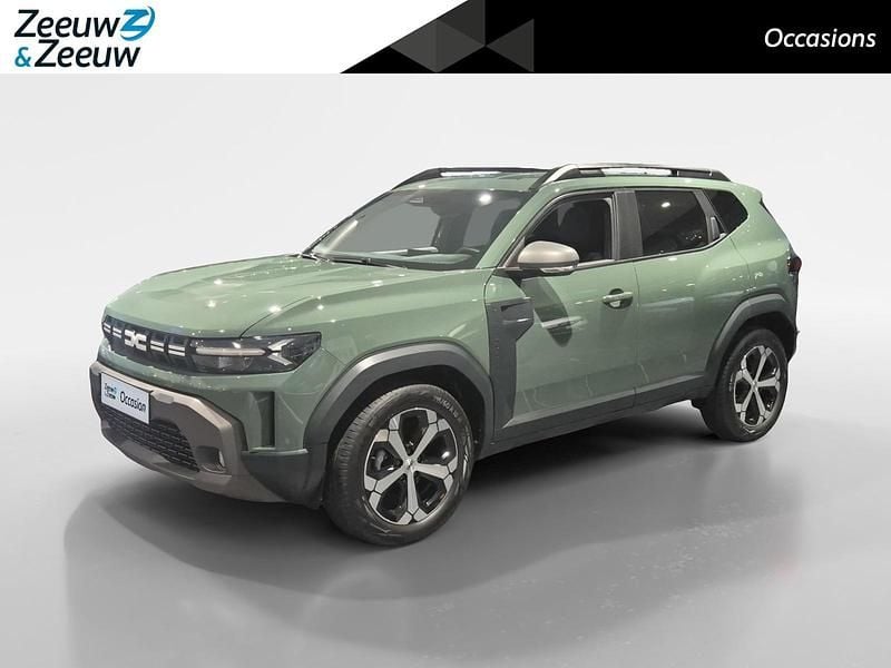 Grey dusty (ovkqm) Occasion 2025 Dacia Duster Journey SUV | € 27.940 (Goede deal) - Afbeelding 1/4