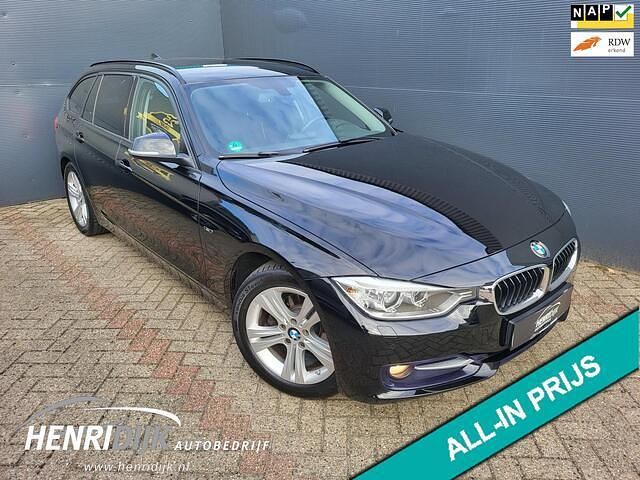 Zwart Gebruikt 2014 BMW 316 Sport Line Stationwagen | € 14.750 (Iets duurder) - Afbeelding 1/4