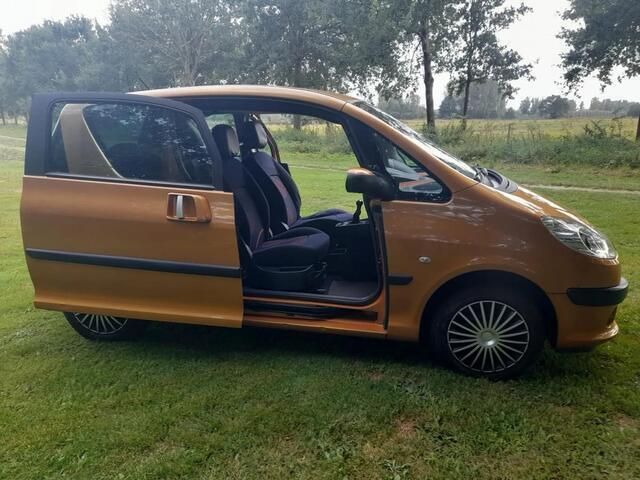 Occasion Peugeot 1007 75 PK (55 kW) 2007 Oranje MPV
