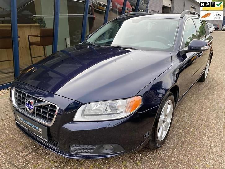Blauw (metallic) Gebruikt 2009 Volvo V70 Momentum Stationwagen | € 15.945 (Duur) - Afbeelding 1/4