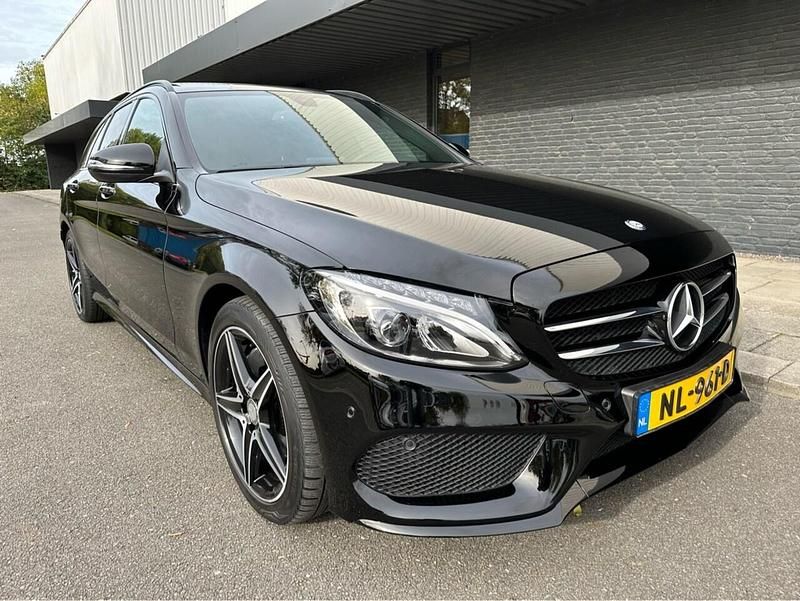 Zwart Occasion 2016 Mercedes C200 Prestige Stationwagen | € 26.995 - Afbeelding 1/4