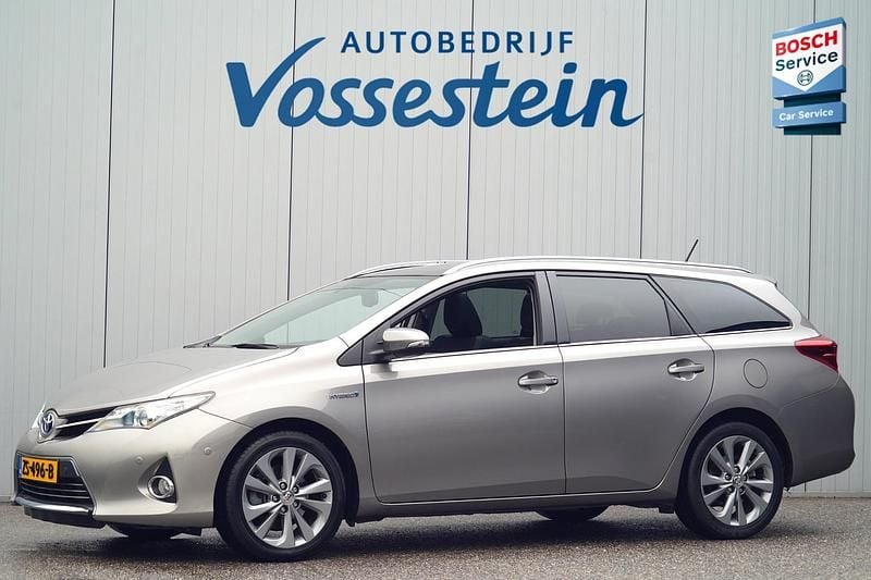 Bruin Gebruikt 2014 Toyota Auris Hybrid Executive Stationwagen | € 9.950 (Goede deal) - Afbeelding 1/4