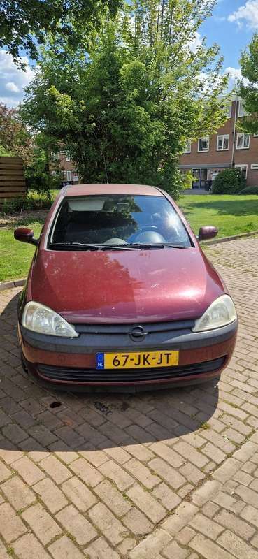 Rood Gebruikt 2002 Opel Corsa Comfort Hatchback | € 750 (Goede deal) - Afbeelding 1/4