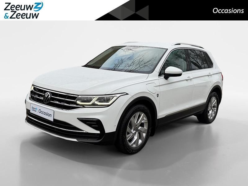 Pure white (0q0q) Occasion 2021 VW Tiguan Business+ SUV | € 28.435 (Super prijs) - Afbeelding 1/4