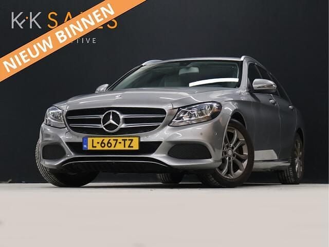 Grijs Gebruikt 2016 Mercedes C160 Prestige Coupé | € 15.940 (Goede deal) - Afbeelding 1/4