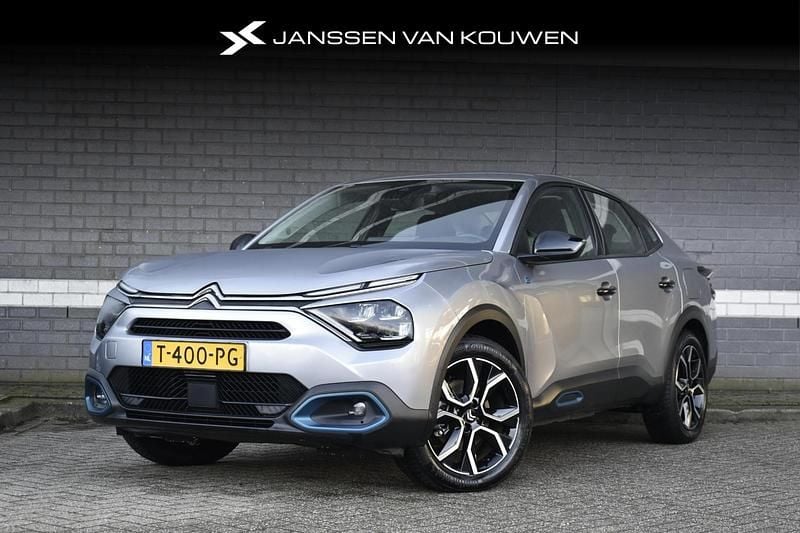 Grijs Gebruikt 2023 Citroën e-C4 Feel Sedan | € 19.745 (Goede deal) - Afbeelding 1/3